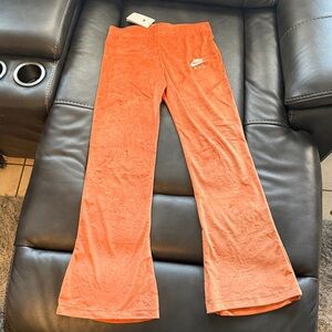 Nike Vibrant Orange Flare Pants
